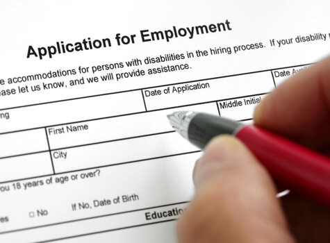job application and pen