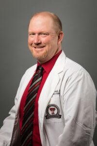 Photo of Dr. Christopher Leach, MD